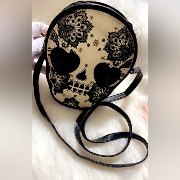 Handbags - Skeleton Skull with Heart Shaped Eyes, Shaped Cross Body Shoulder Bag
6” X 8”.